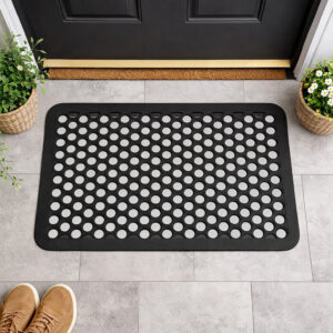 Top view of rectangular rubber entry mat at front door