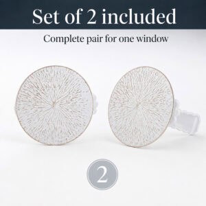 Pair of white and gold round curtain tieback clips on one window, set of 2