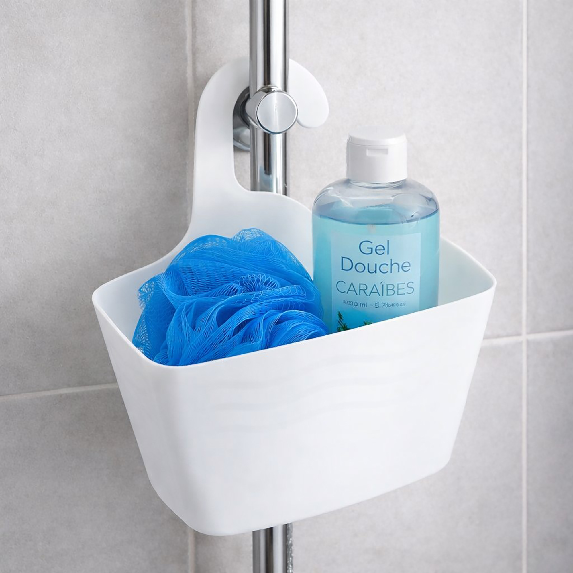 White plastic hanging shower caddy on chrome shower rod with blue loofah and shower gel