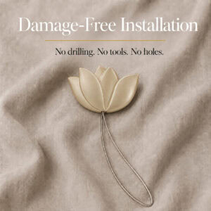 installation: Gold resin tulip tieback resting on soft linen with its twisted cable loop, illustrating tool free installation with no drilling or holes.