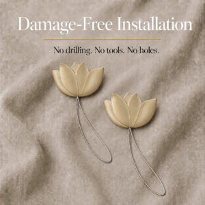 installation: Two gold resin tulip tiebacks resting on soft linen with twisted cable loops, illustrating tool free installation with no drilling or holes.