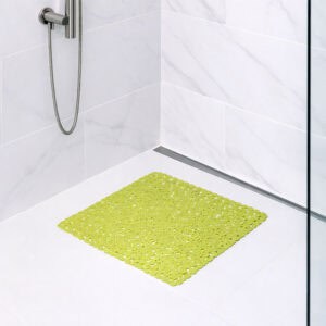 Lime bubble-pattern shower mat on tile shower floor