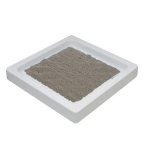 Taupe bubble-pattern shower mat in white square shower base, angled view