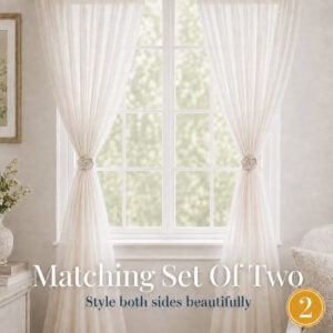 Matching pair of floral curtain tiebacks styling a window, set of 2
