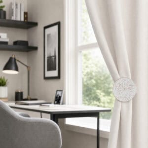 White and gold round curtain tieback clip in an office setting