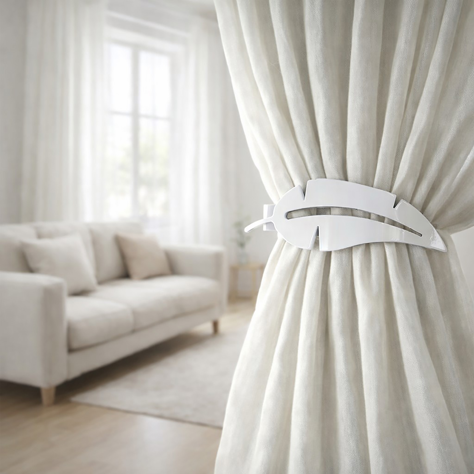"White feather curtain tieback on cream drape in bright living room"