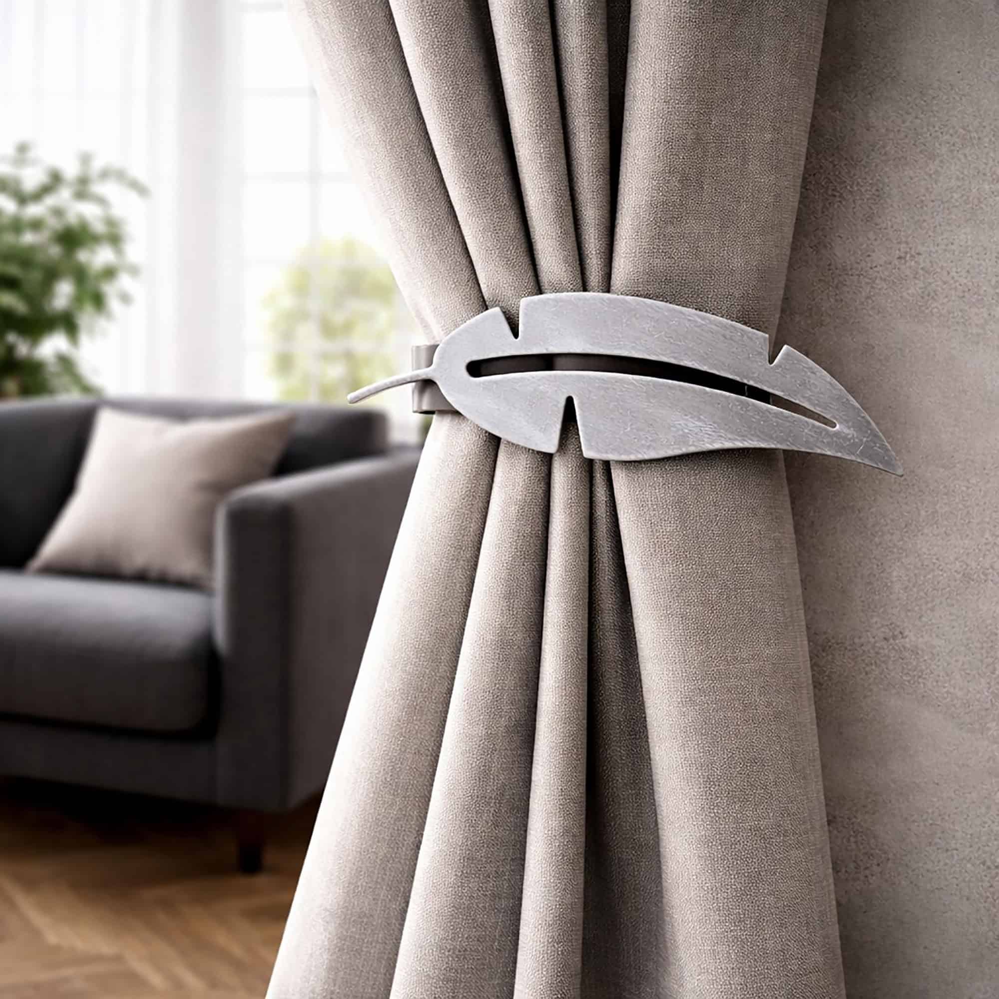 "Grey feather tieback on taupe velvet curtain in modern living room"