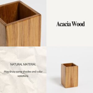 A close-up of the wooden toothbrush holder showcasing its natural grain and color variations.