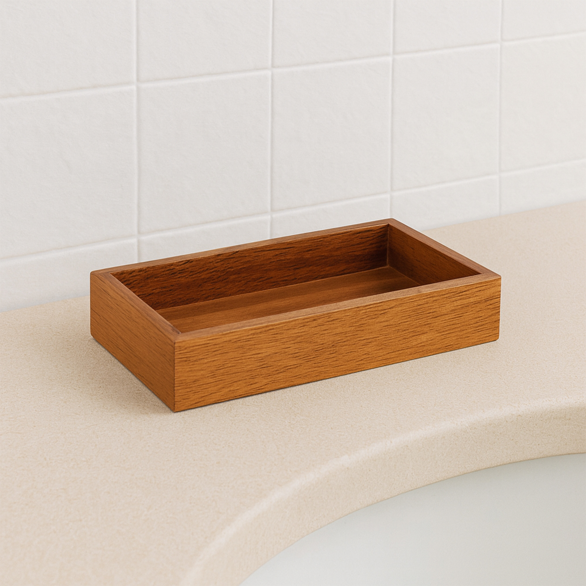Rectangular acacia wood soap dish on bathroom countertop