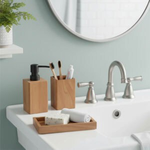 Acacia soap dispenser, toothbrush holder, and tray on bathroom sink