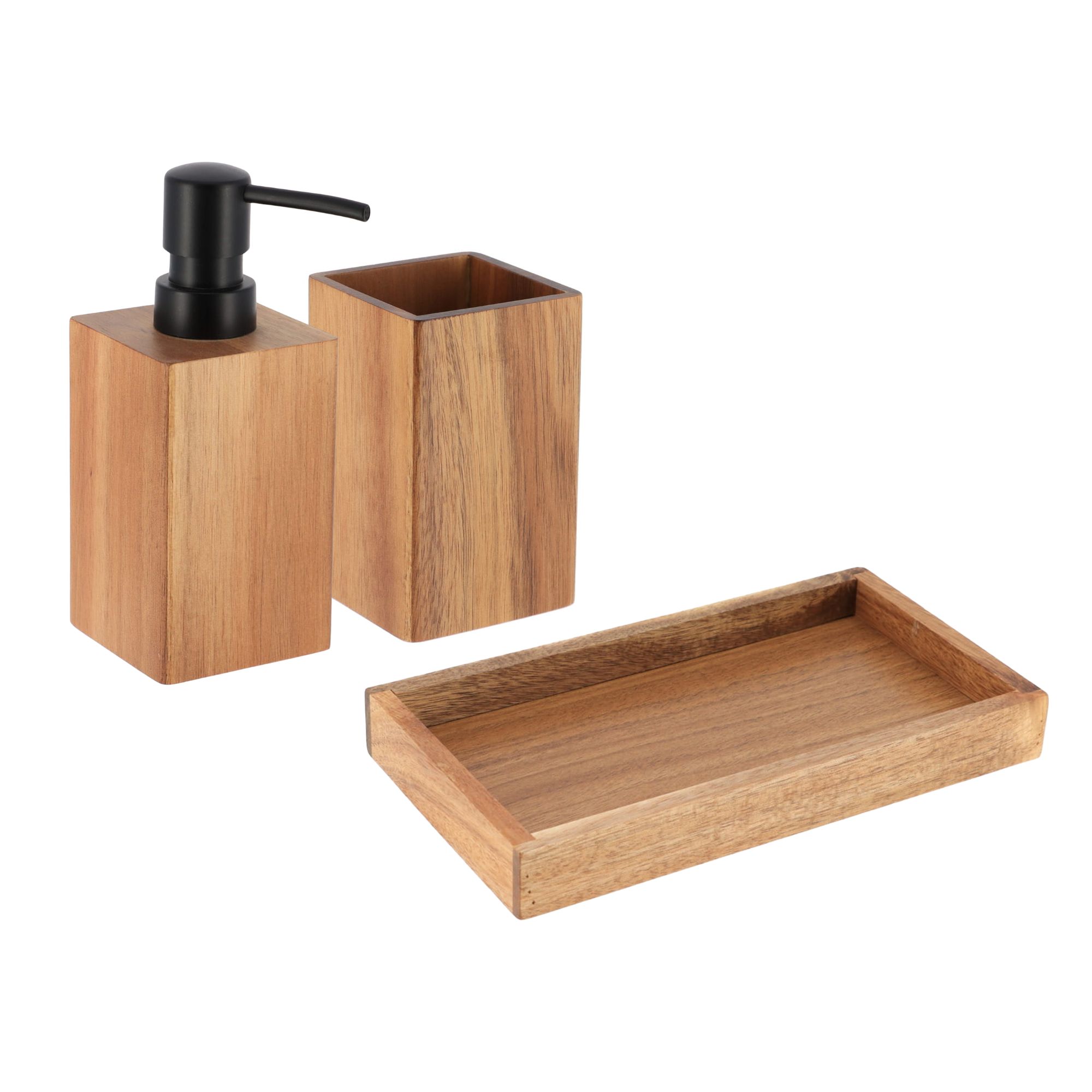 A three-piece bathroom set including a soap dispenser, toothbrush holder, and tray.