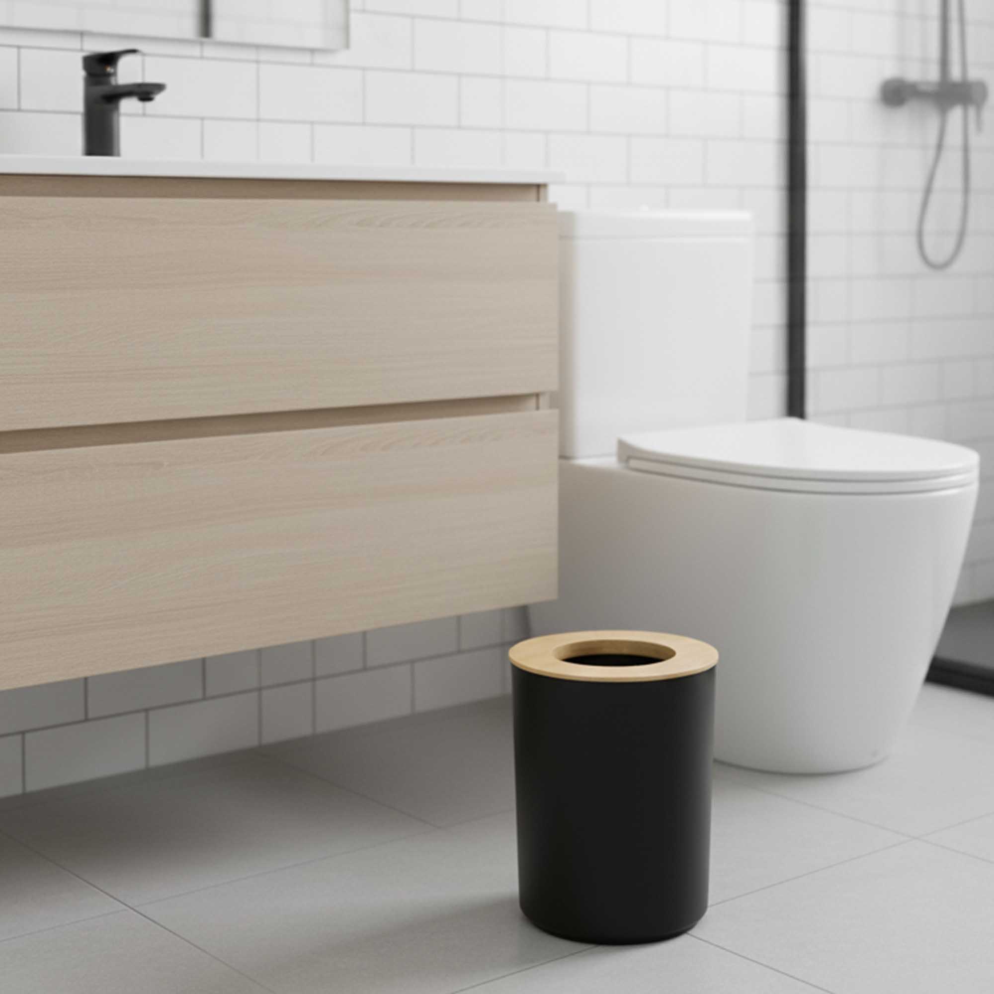 Modern bathroom scene with black trash can and bamboo top