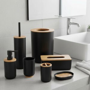 Black bathroom accessory set with bamboo accents on vanity