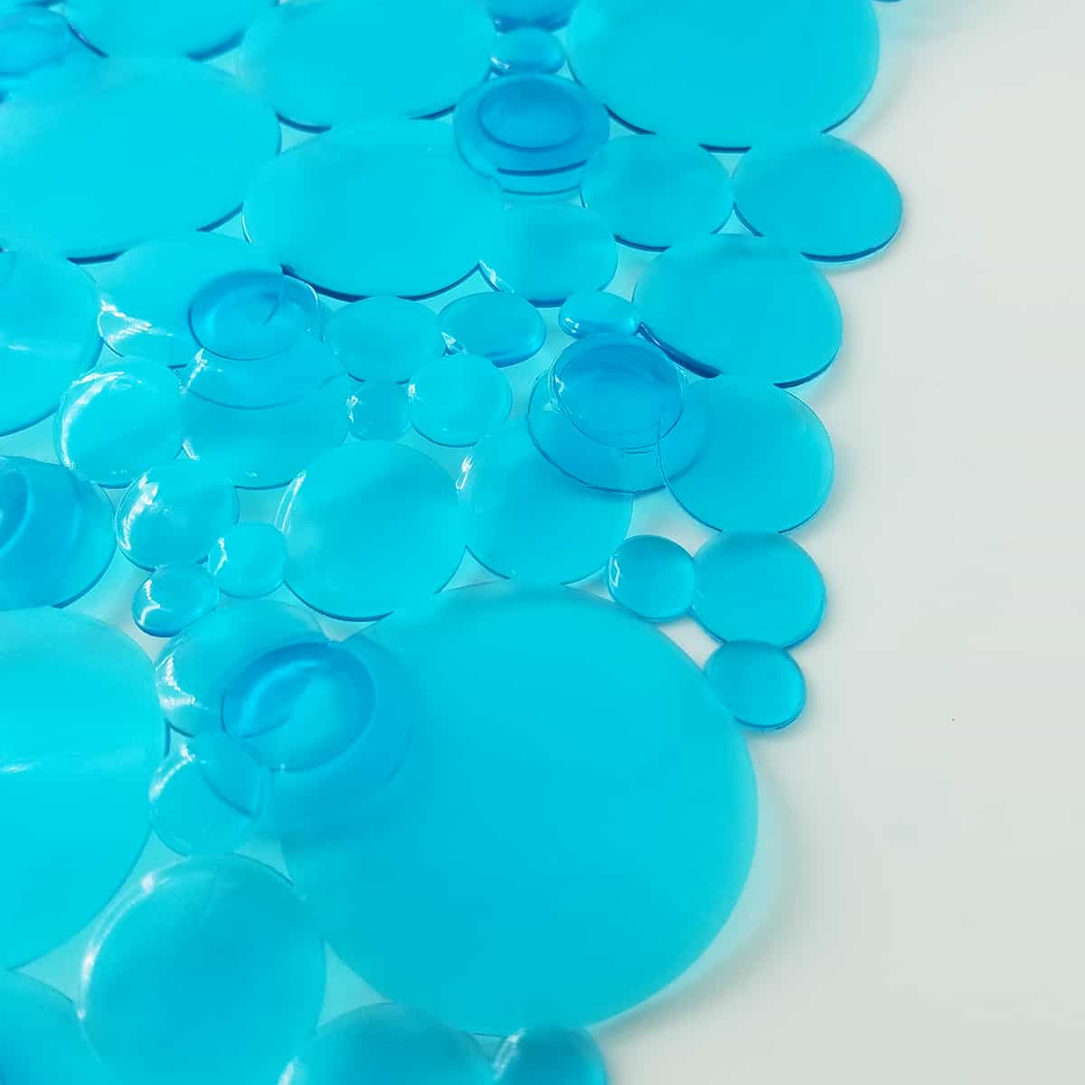 https://evideco.com/wp-content/uploads/2022/04/7216147-Non-Skid-Bath-Shower-Mat-Square-Bubbles-20-x-20-Aqua-Blue-5.jpg