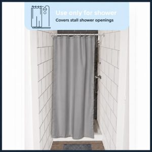 Gray 48 x 72 inch shower curtain covering the opening of a small tiled shower stall