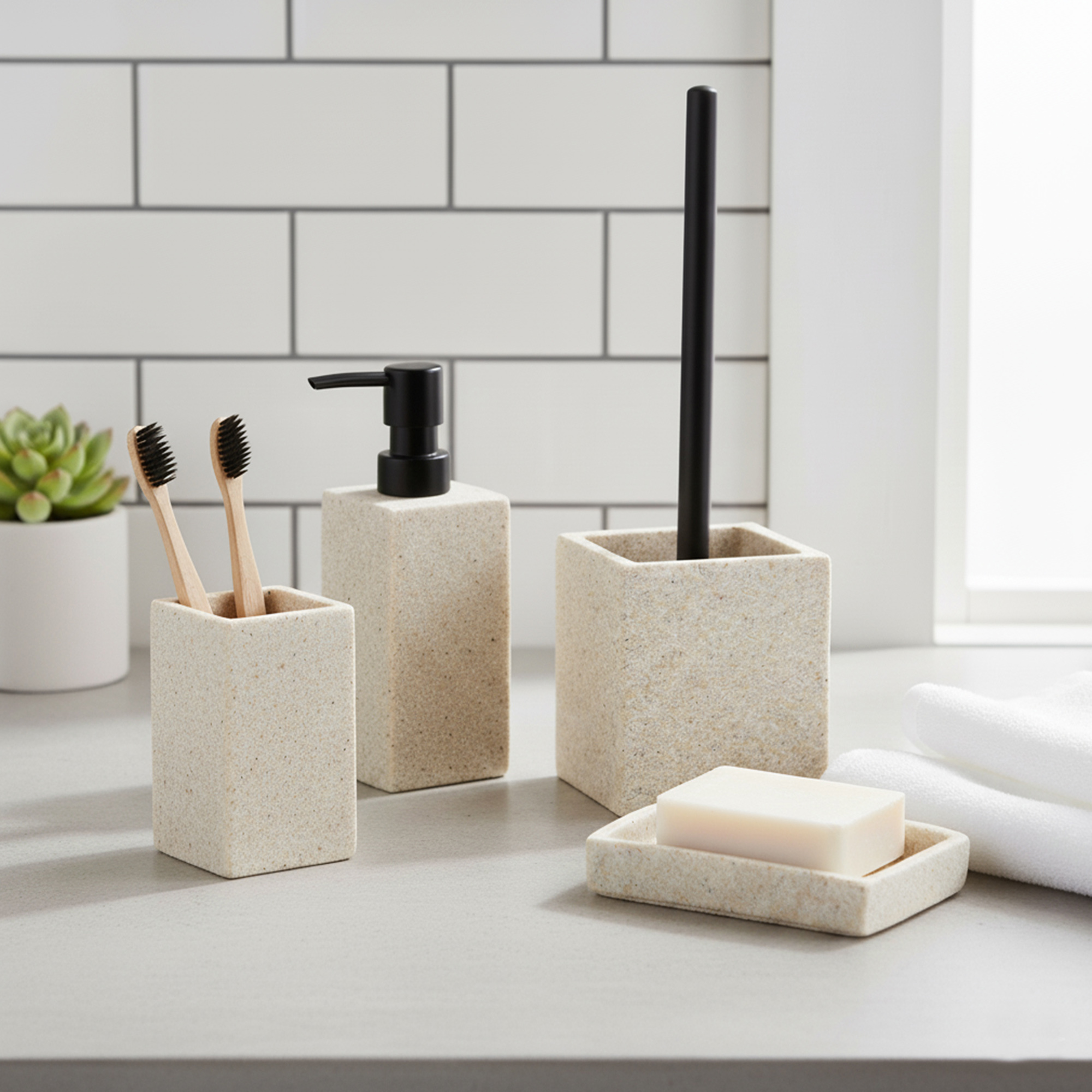 Light stone effect bathroom set arranged on modern vanity