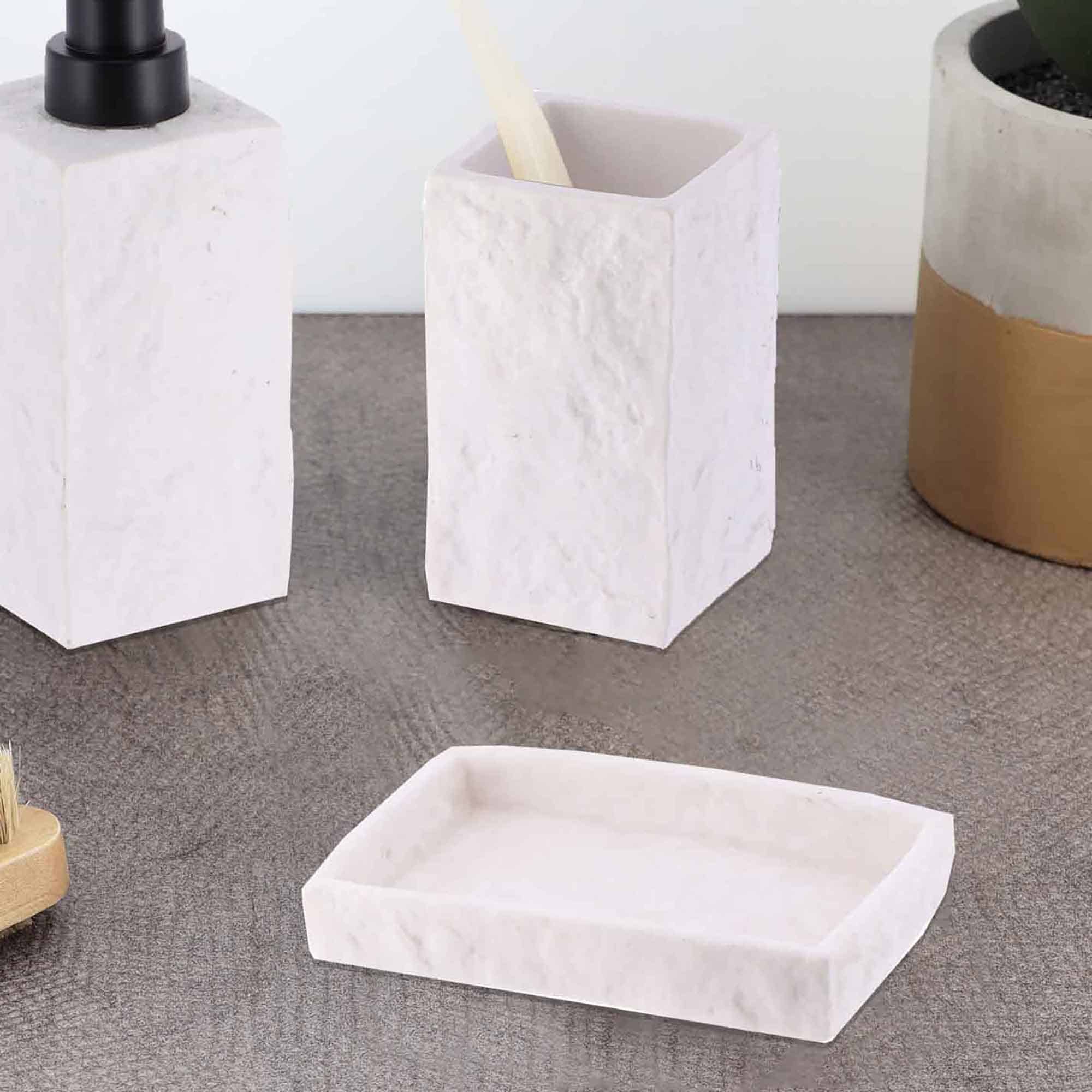 A close-up of a white stone-effect rectangular soap dish showcasing its minimalist design and smooth texture.