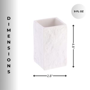 Dimensions of the white stone-effect bathroom tumbler are shown, highlighting its 4.8-inch height, 2.8-inch width, and 9-ounce capacity.