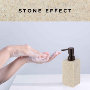 A demonstration of handwashing with soap lather, accompanied by a natural stone-effect soap dispenser featuring a black pump on a clean countertop.