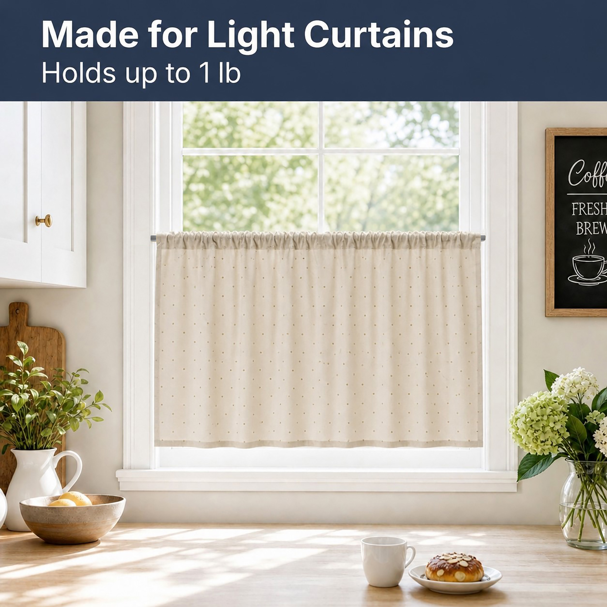 Lightweight silver cafe curtain rod holding a cream-colored polka dot curtain on a kitchen window, supporting up to 1 lb.