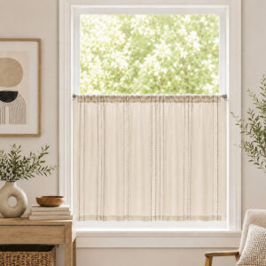 Small kitchen window featuring a sheer off-white curtain with thin vertical stripes mounted on a silver cafe rod.