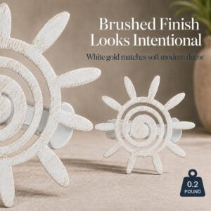 7- Macro view of two distressed white gold sun tiebacks showing the brushed antiqued finish and slim flat metal profile.