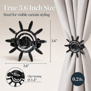 8- Black silver sun tieback shown at true three point six inch size with a one point four inch clip opening detail.