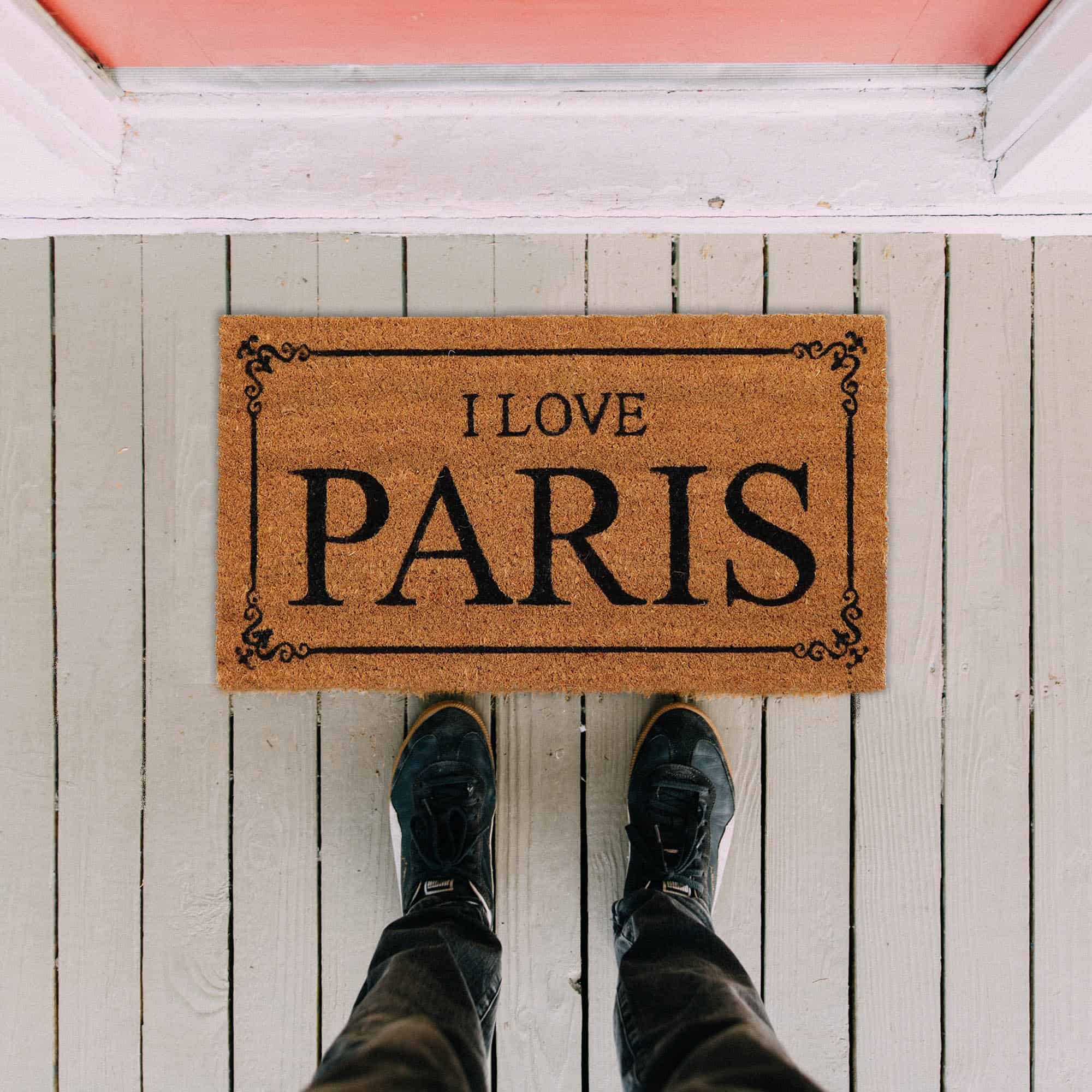 printed coir door mat at entrance door with men feet