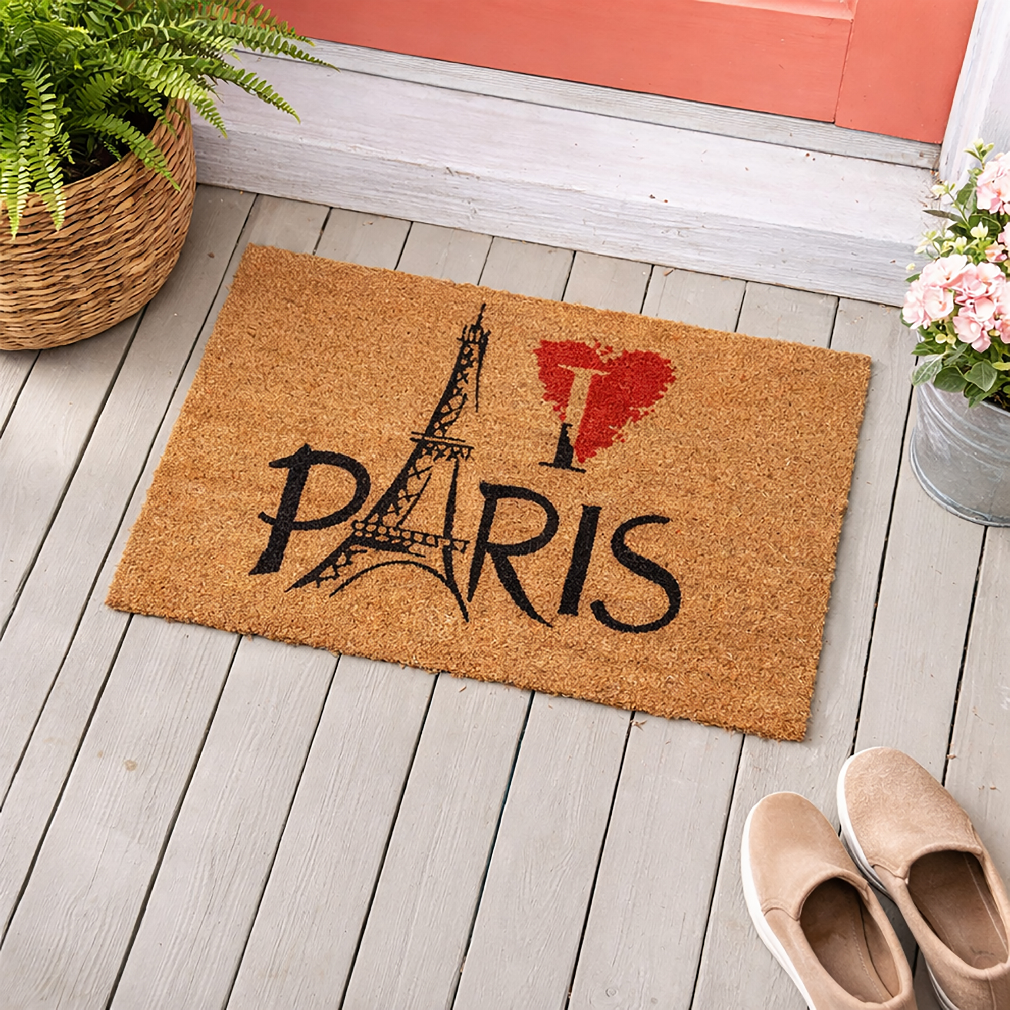 Paris Eiffel doormat on porch with plants coral door