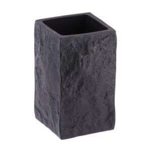 A close-up view of a black bathroom tumbler with a stone-effect texture, showcasing its minimalist rectangular design.