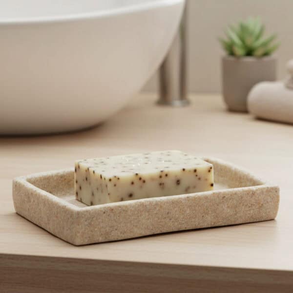 Natural stone effect soap dish holding bar soap on vanity