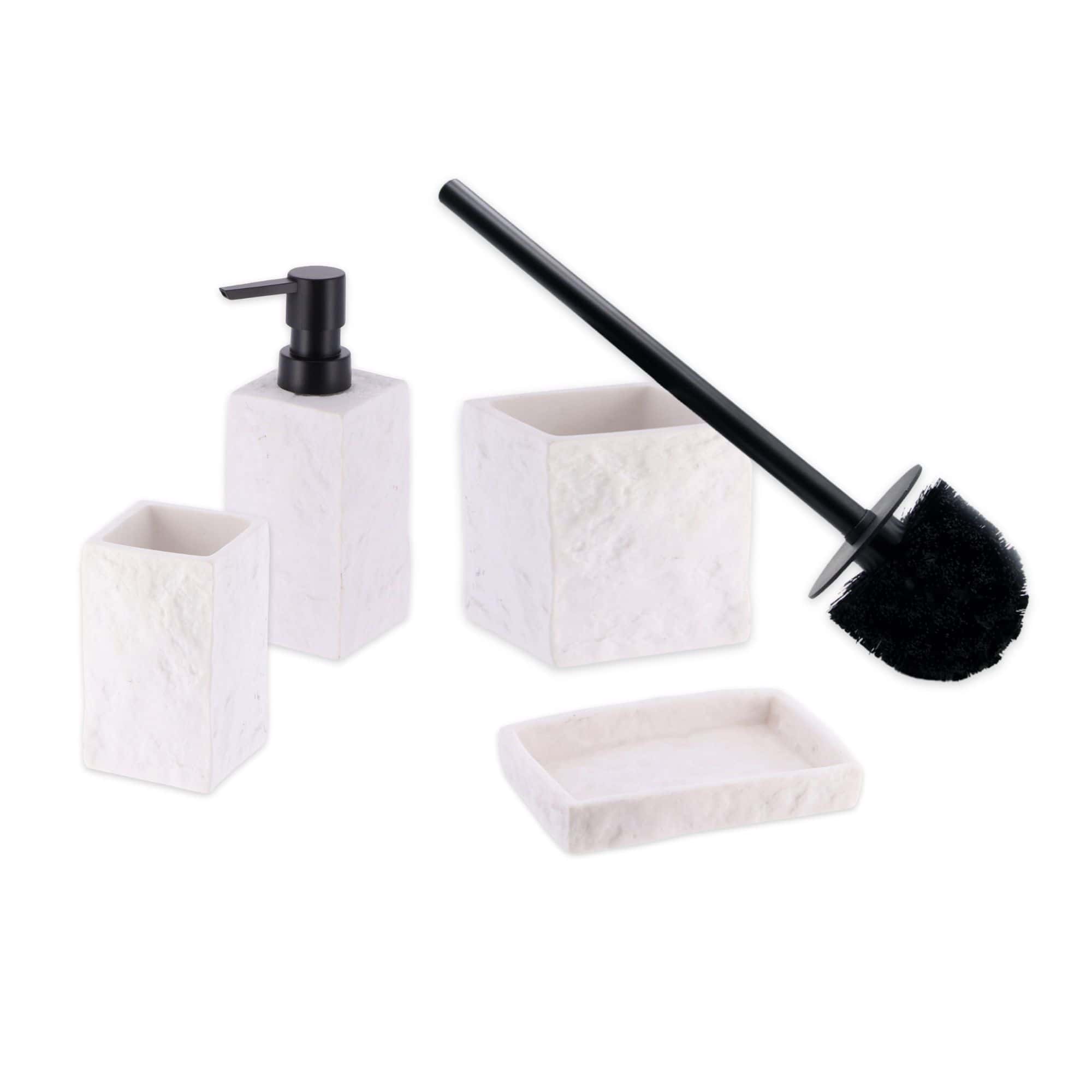 A complete white stone-effect bathroom accessory set featuring a toilet brush holder, tumbler, soap dish, and soap dispenser with a black pump.