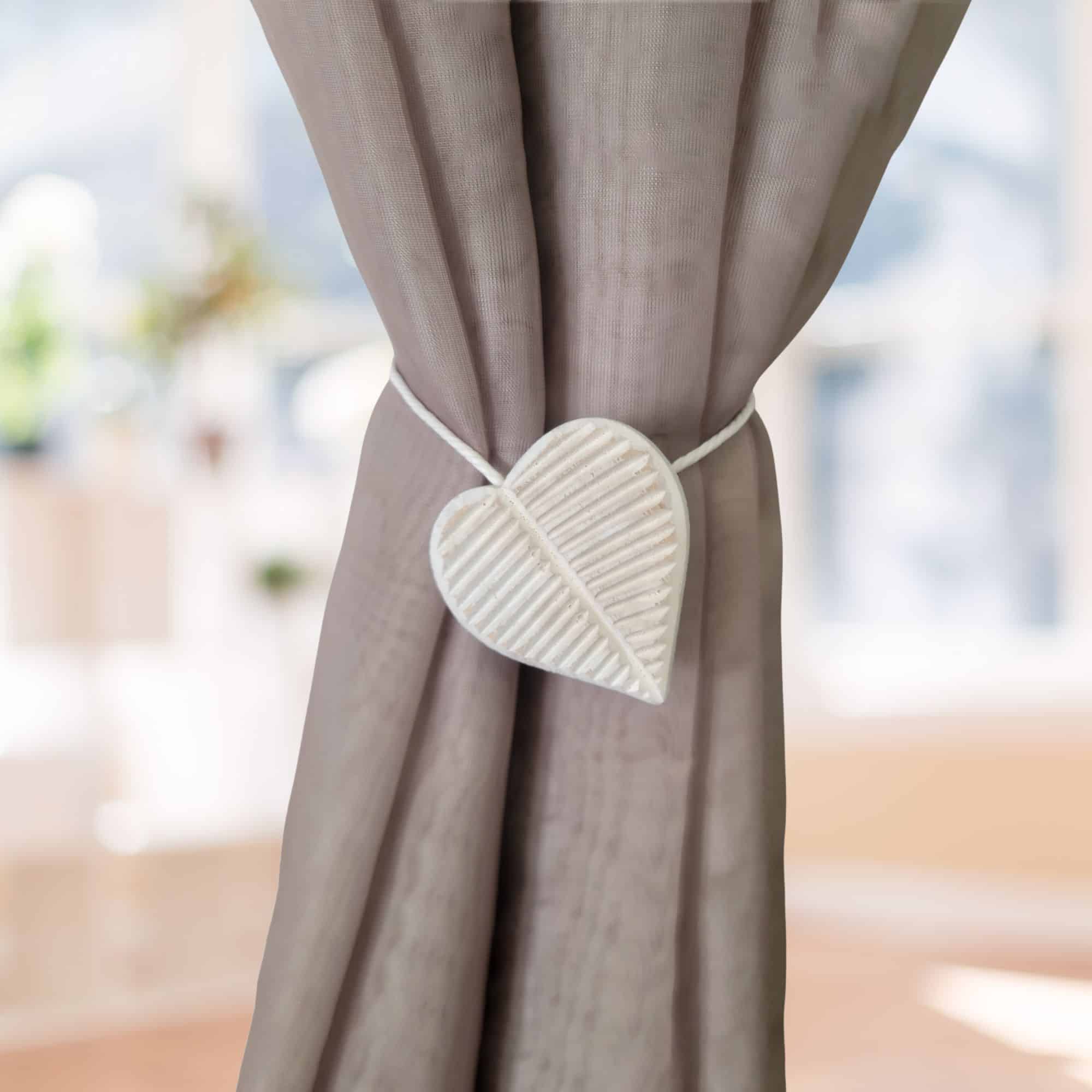 heart curtain holdback on beige curtain