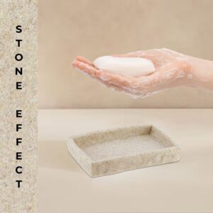 A natural stone-effect rectangular soap dish holding a bar of soap, complementing a modern bathroom decor with a clean and minimalist style.