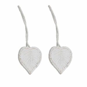 White wooden heart-shaped curtain tiebacks with rope cord