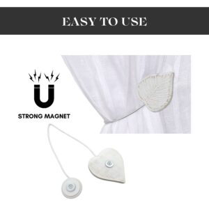 Magnetic curtain tieback mechanism showing strong magnet