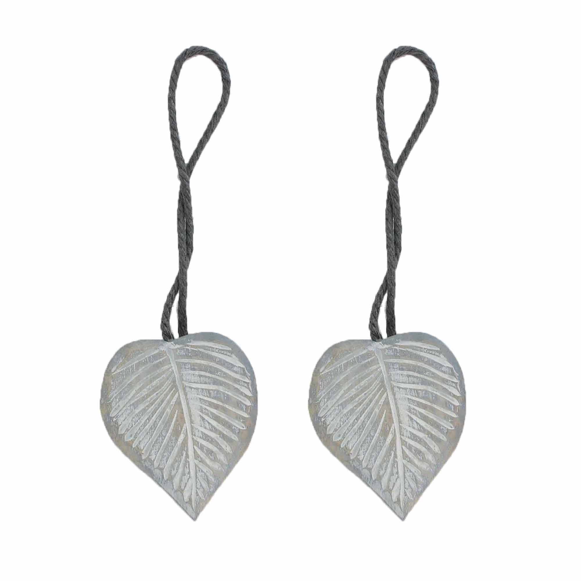 Gray wooden heart-shaped curtain tiebacks with gray rope cord