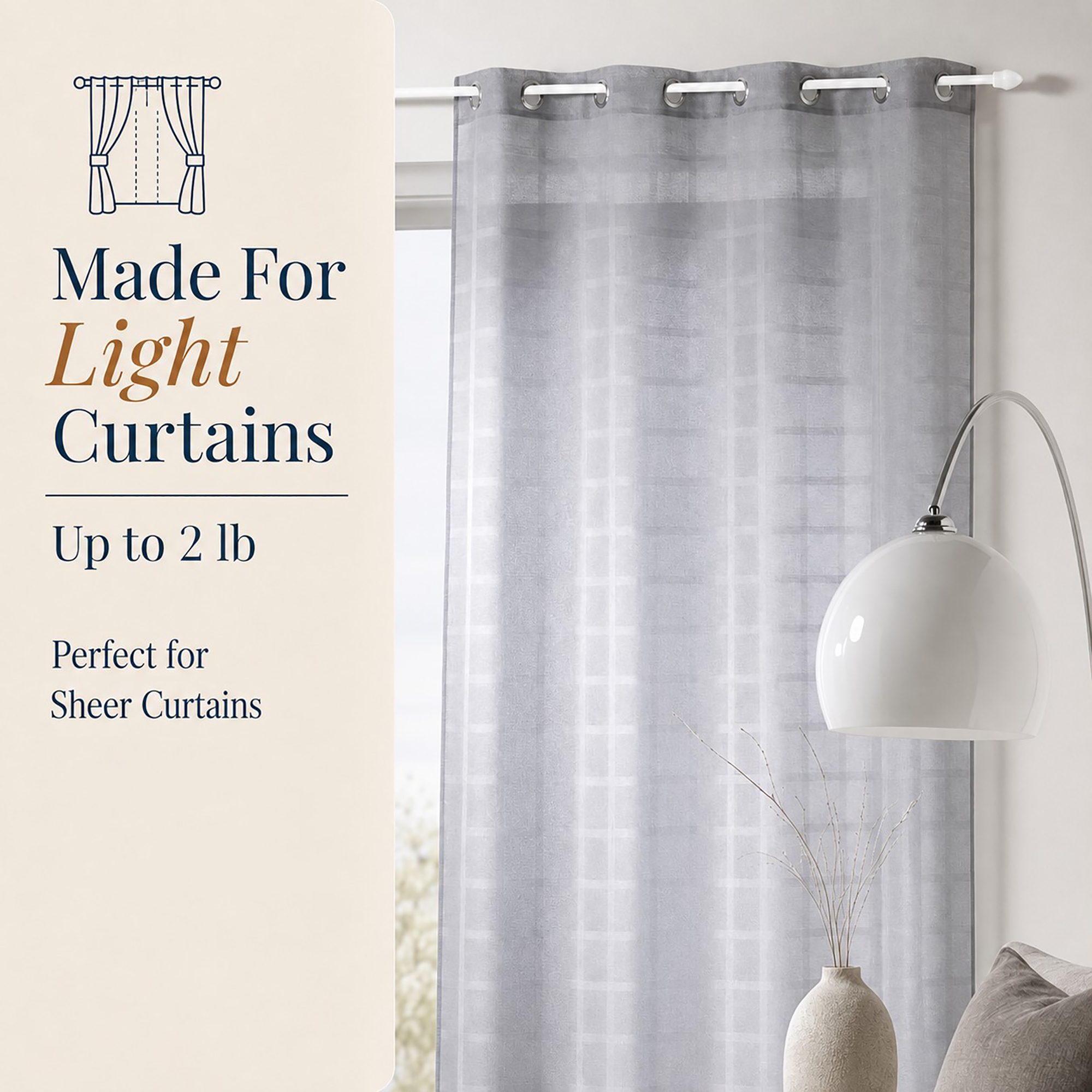 Grey sheer grommet curtain hanging from a white cafe rod in a bright living room