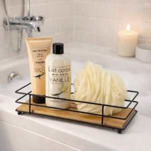 "Bamboo and black wire tray holding vanilla shower gel, body lotion, and loofah on bathtub ledge"