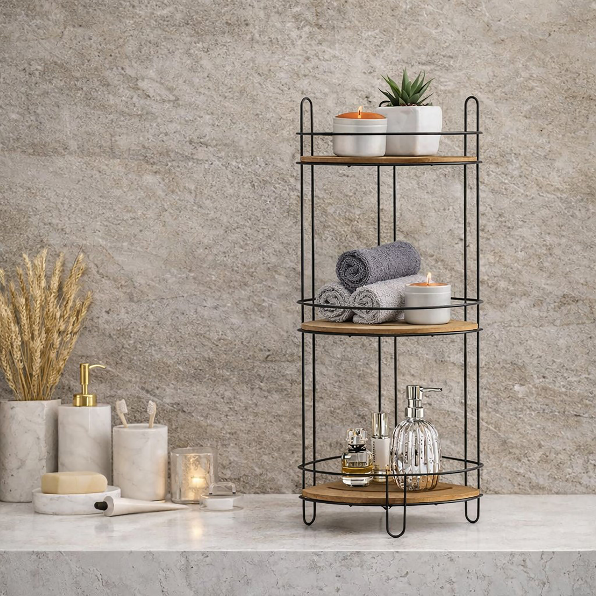 "Three-tier black wire corner shelf with candles, towels, and perfume on marble bathroom counter"