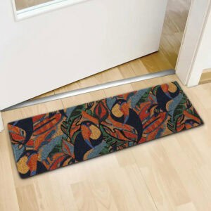 Toucan design doormat indoors near open white door