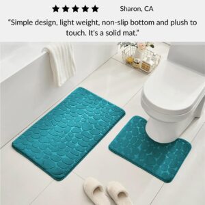 Peacock blue contour and standard memory foam mats with pebble design positioned around toilet with slippers and customer review overlay