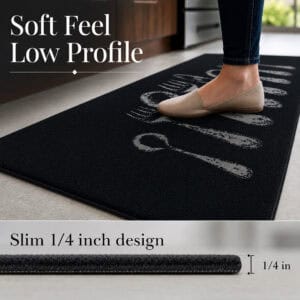Foot in a flat shoe resting on the black kitchen runner, with a side view below showing the slim one quarter inch low profile height.