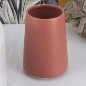 Close-up of terracotta matte tumbler toothbrush holder