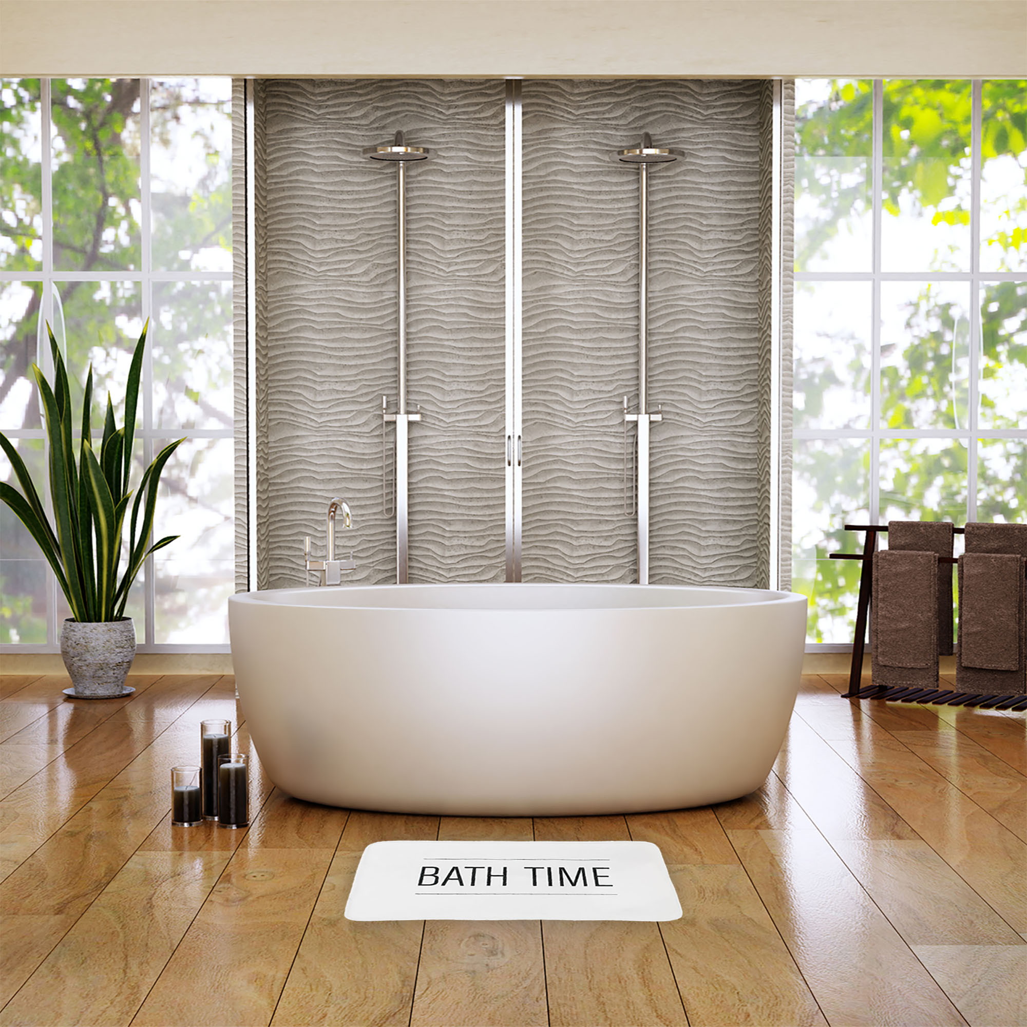 White bath mat in spa-like bathroom with freestanding tub and textured tile shower wall