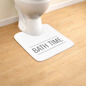 "White 'Bath Time' contour rug around toilet on wood-look floor"