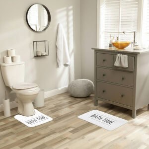 white and black bathmat set writing bath time on bathroom floor
