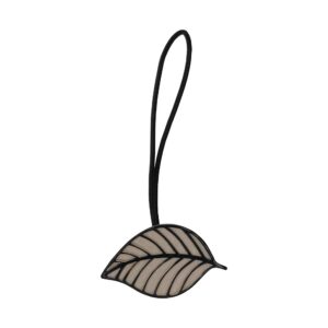 Taupe magnetic leaf curtain tieback with black leather cord on white background
