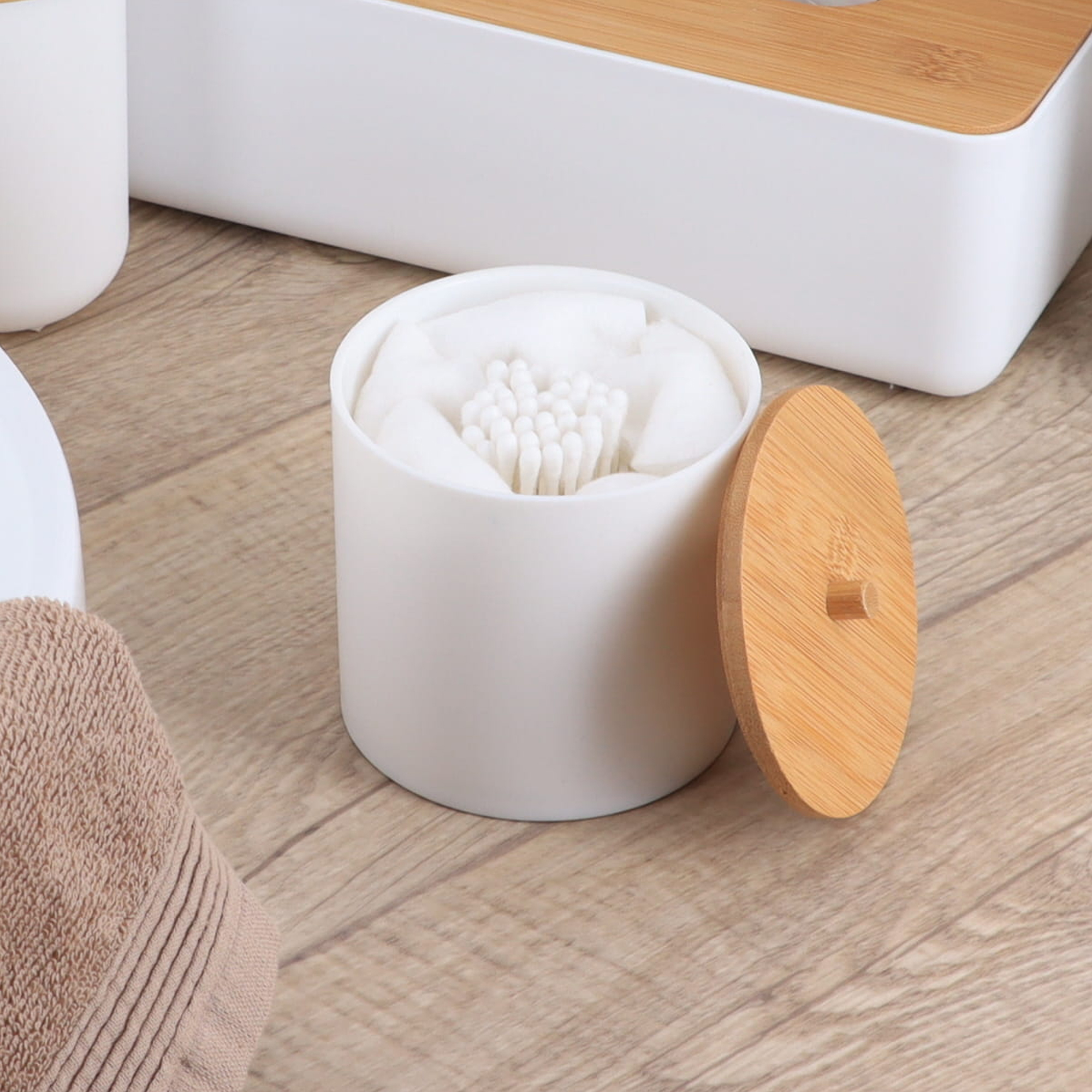 White cotton swab holder with bamboo lid and divided interior