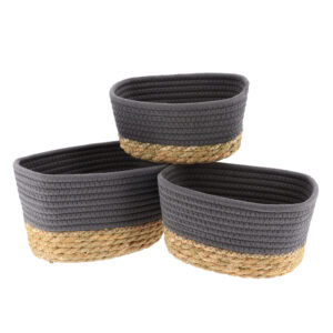 Set of three gray cotton rope and natural seagrass oval storage baskets shown empty on a white background.